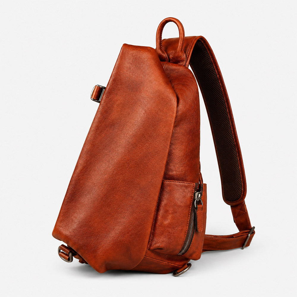 Brown leather shoulder bag for men shown at a front angle with large-capacity full-grain waist pack structure