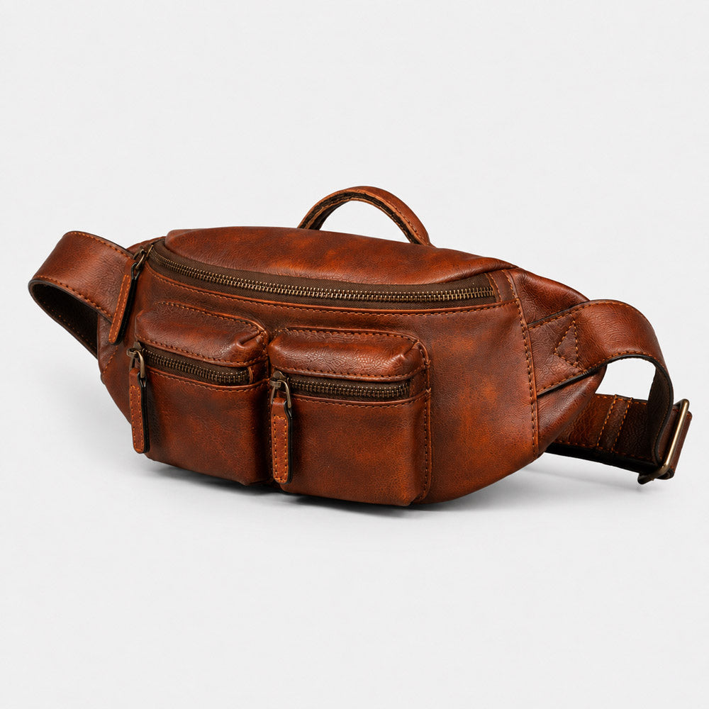 Brown full-grain leather designer bum bag for men shown at a front angle with multi-pocket concealed carry design