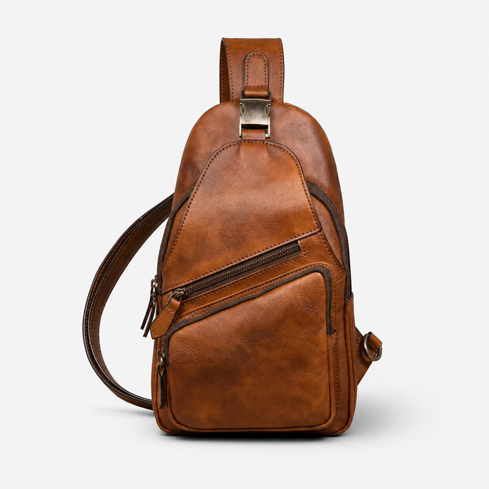 Front view of vintage leather fanny pack holster with compact body-hugging shape, smooth zippers, and leather logo patch