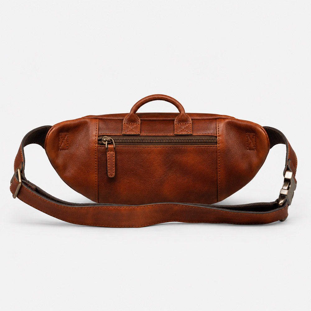 Back view of brown leather concealed carry fanny pack with adjustable strap and clean rear construction