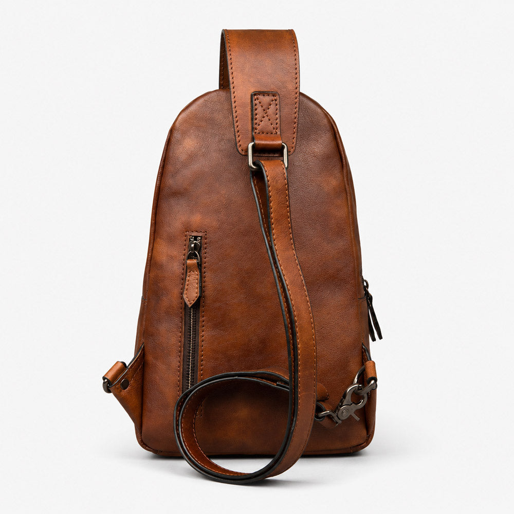 Back view of handmade leather bum bag with adjustable strap, clean leather panel, and secure body-hugging carry design
