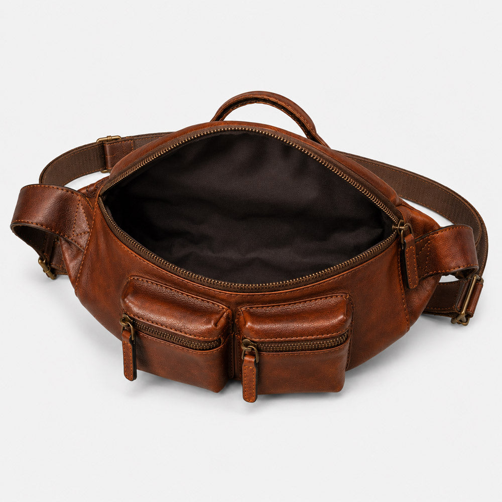 Open interior of leather fanny pack for men showing main compartment, inner organizers, and space for phone, wallet, and essentials