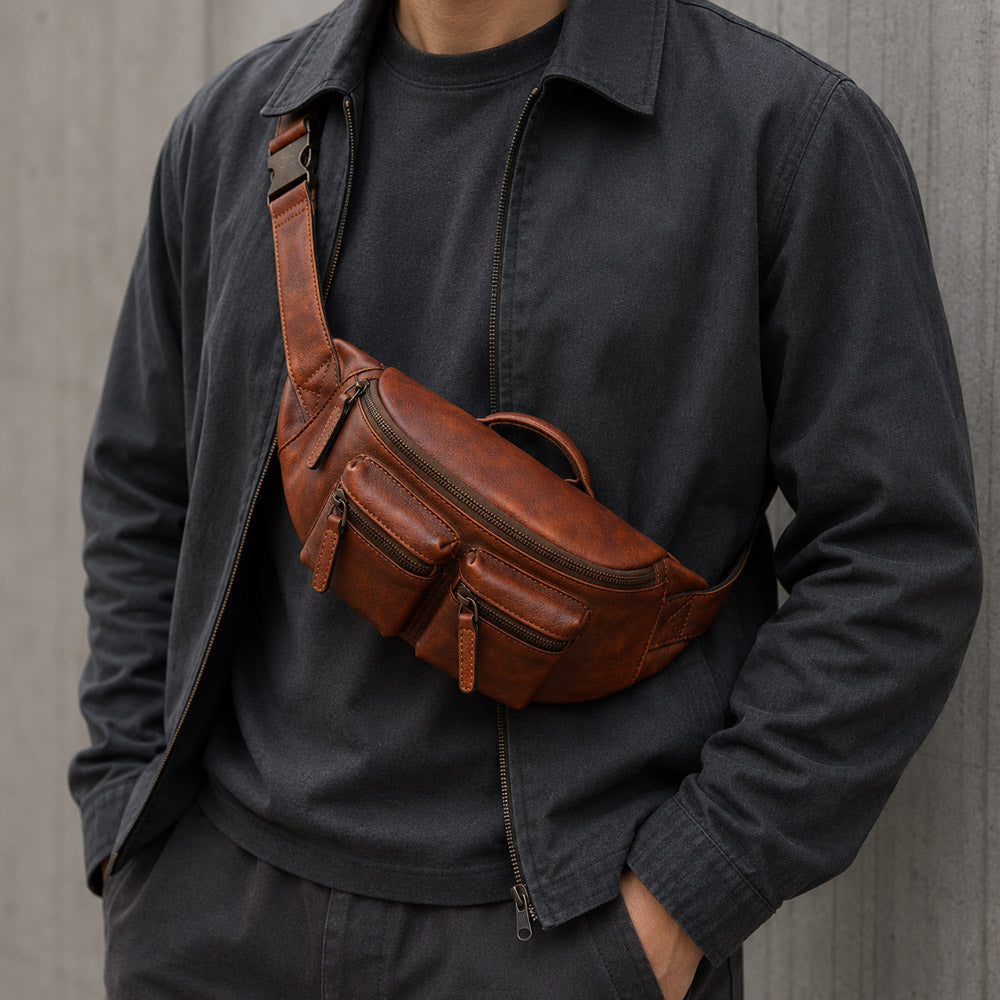 brown leather designer bum bag for men shown in a clean studio view with concealed carry multi-pocket structure