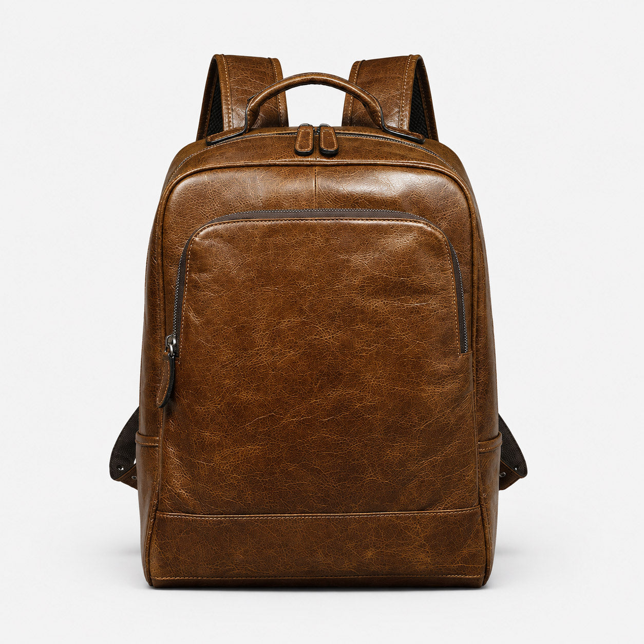 Brown oil-wax leather backpack front view with structured zip pocket