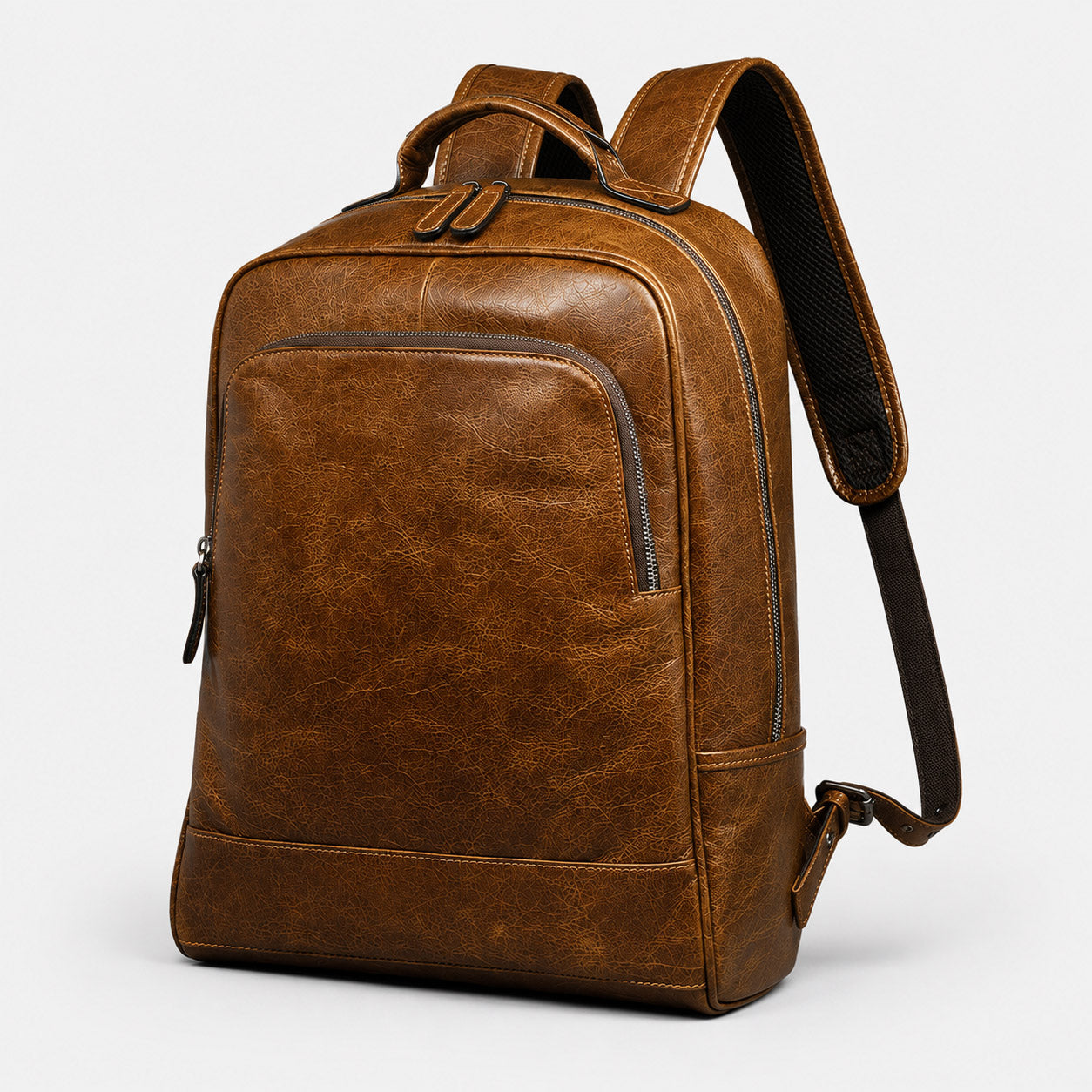 Oil-wax leather laptop backpack three-quarter view showing depth and side pocket