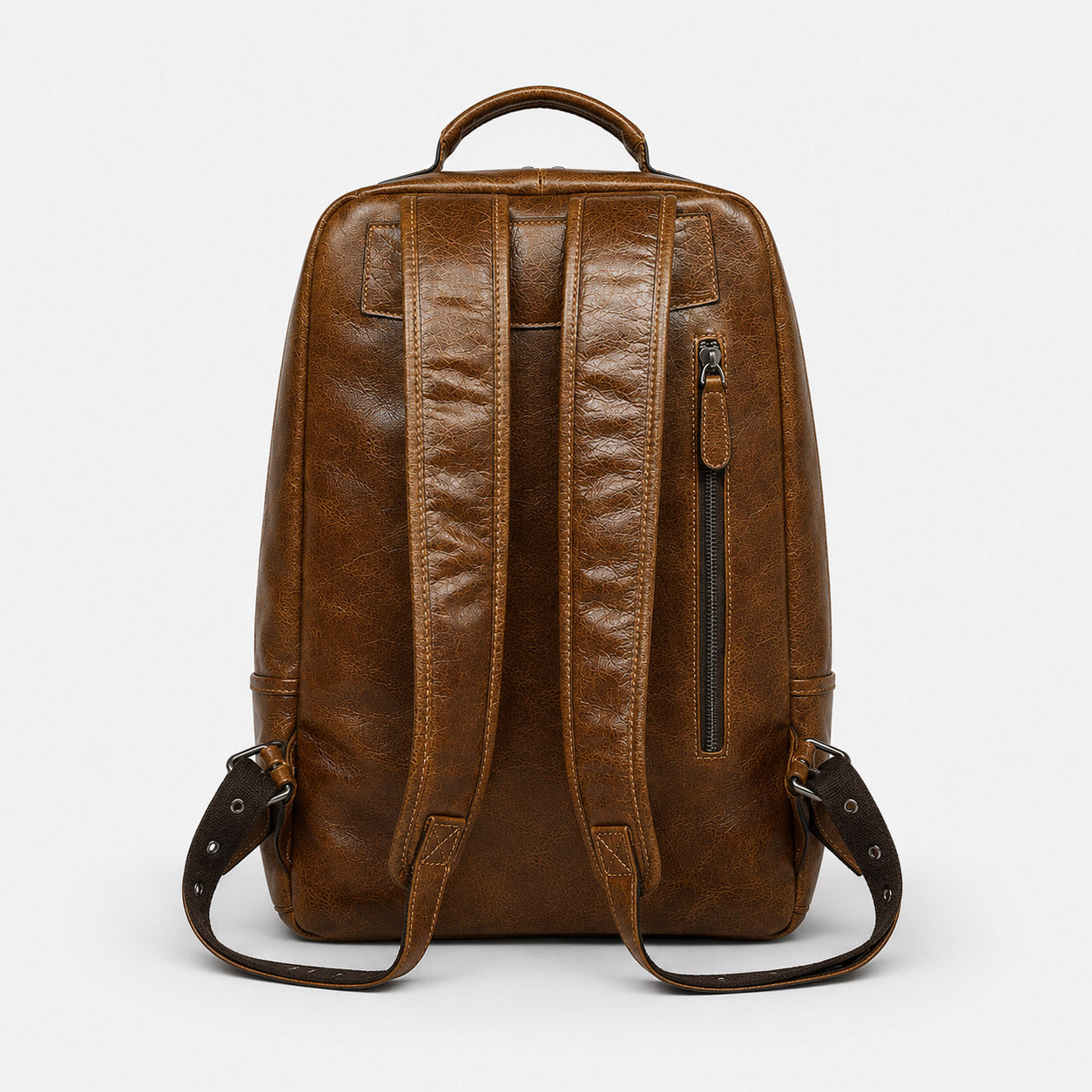 Leather backpack rear panel with adjustable dual leather shoulder straps and back zip pocket