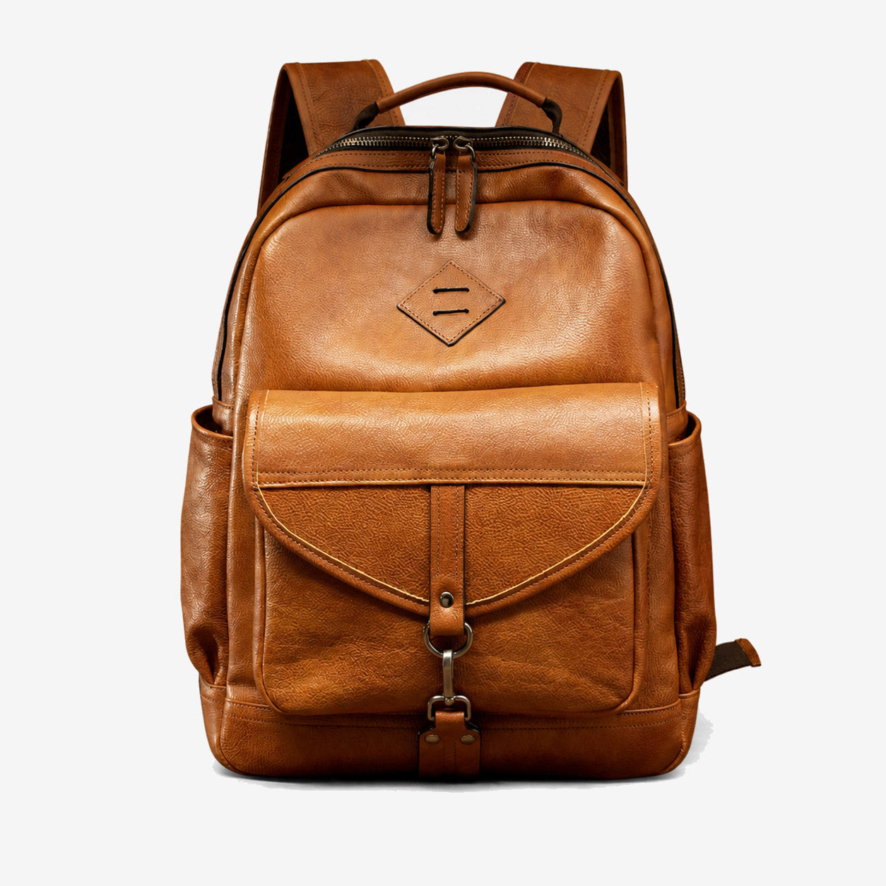 Light brown vegetable-tanned leather backpack front view with buckled flap pocket