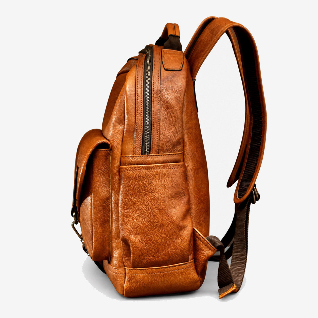 Side profile of the leather backpack showing the side pocket and full-length zip