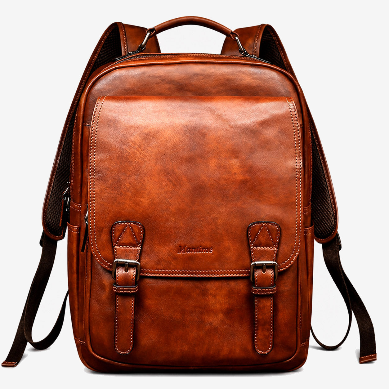 Hand-burnished brown leather backpack front view with twin buckled flap straps