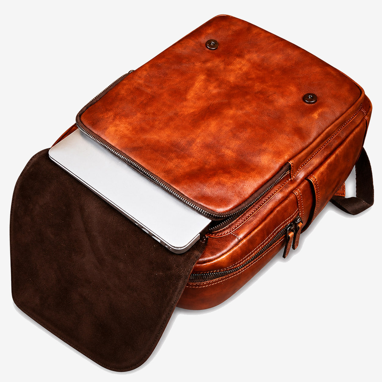 A 15-inch laptop sliding into the backpack's dedicated suede-backed sleeve